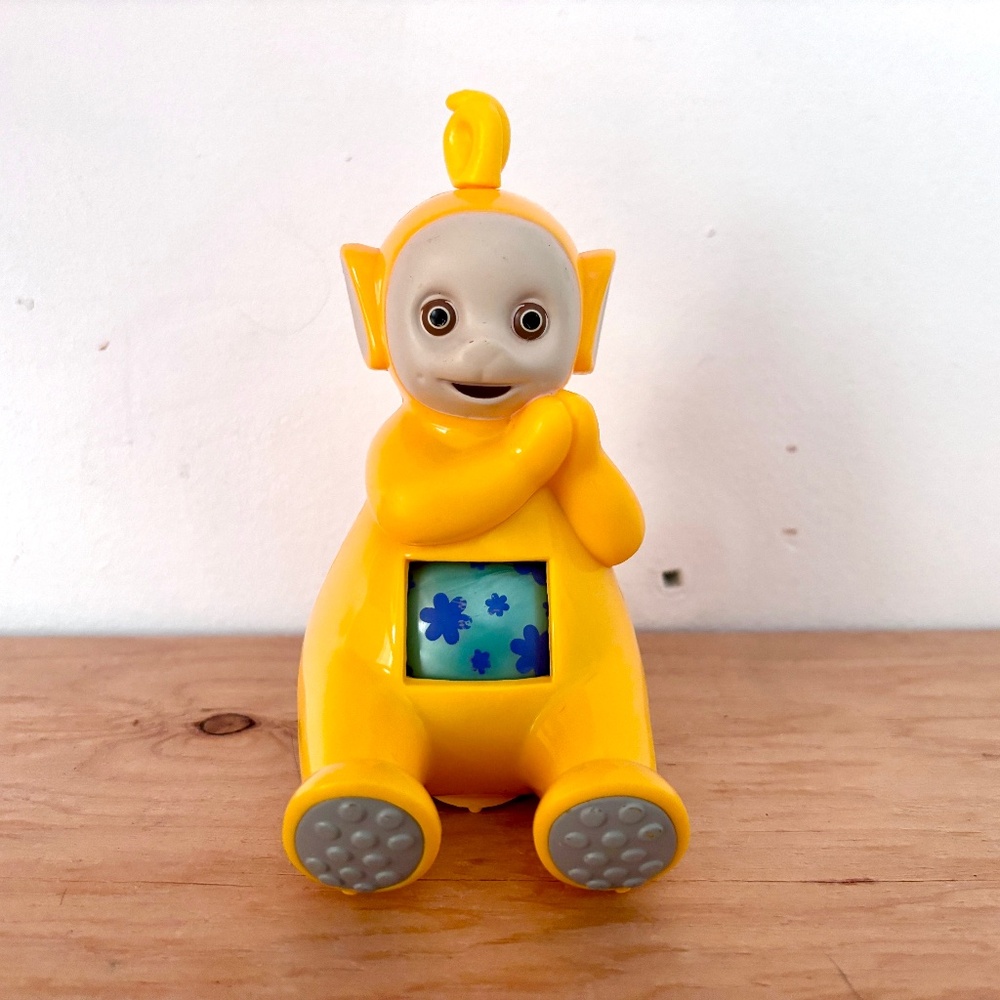 Vintage 90s Teletubbies Laa-Laa Toddlin Teletubby Rolling Baby Toy